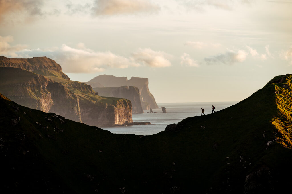 This image has an empty alt attribute; its file name is Hiking.-Photo-credit-Chris-Riefenberg-Visit-Faroe-Islands-1024x681.jpg